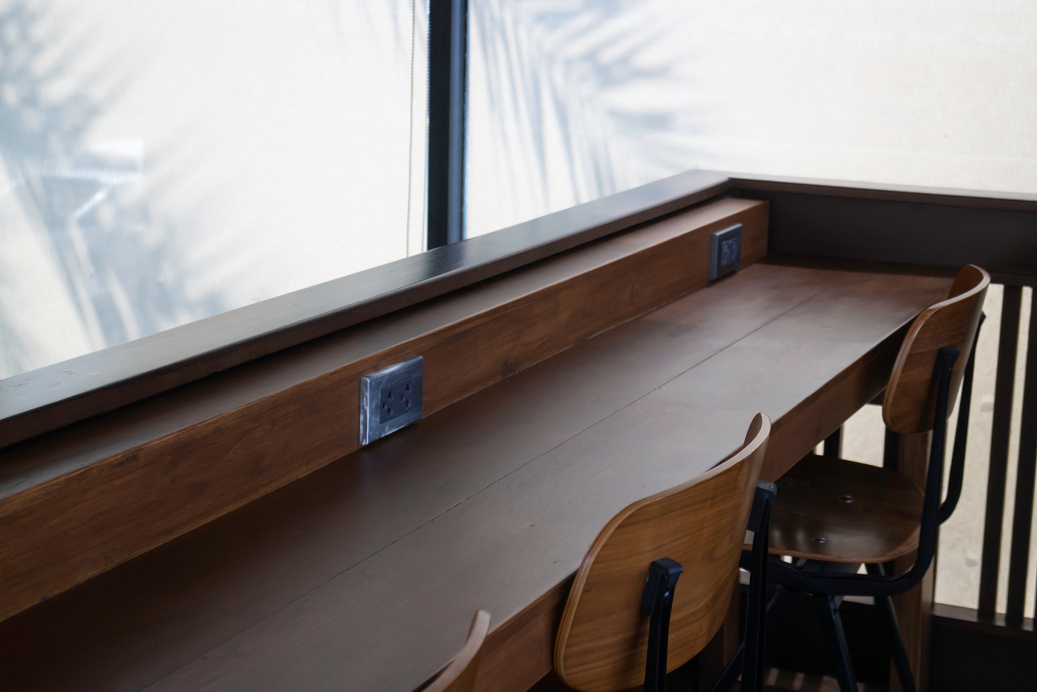 Wooden Tables and Chairs with Windows 